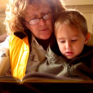 Grandparent reading to child
