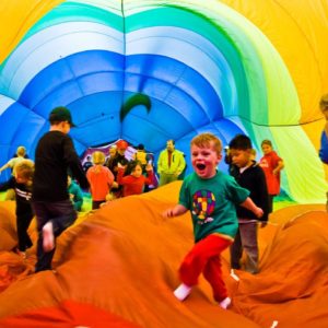 Kid Playing in a Balloon